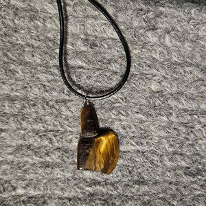 NWOT tiger eye gemstone axe/battle axe pendant, black cord, artisan, unisex